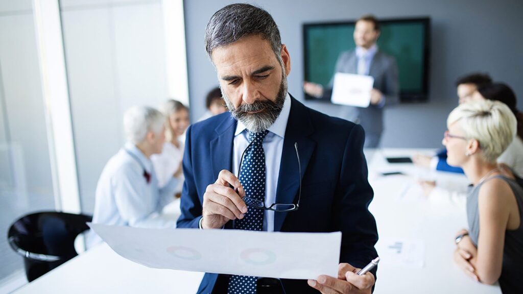people interacting in a conference room bancor